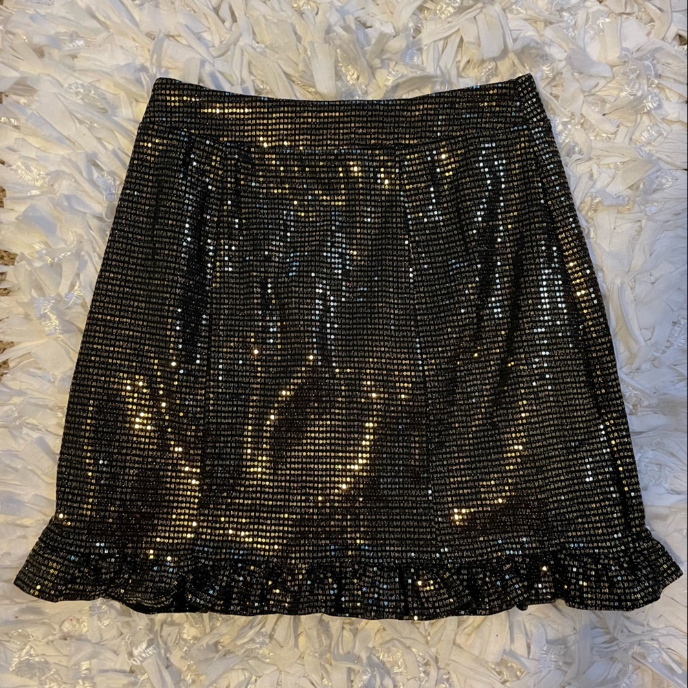 Francesca’s gold sparkly black skirt